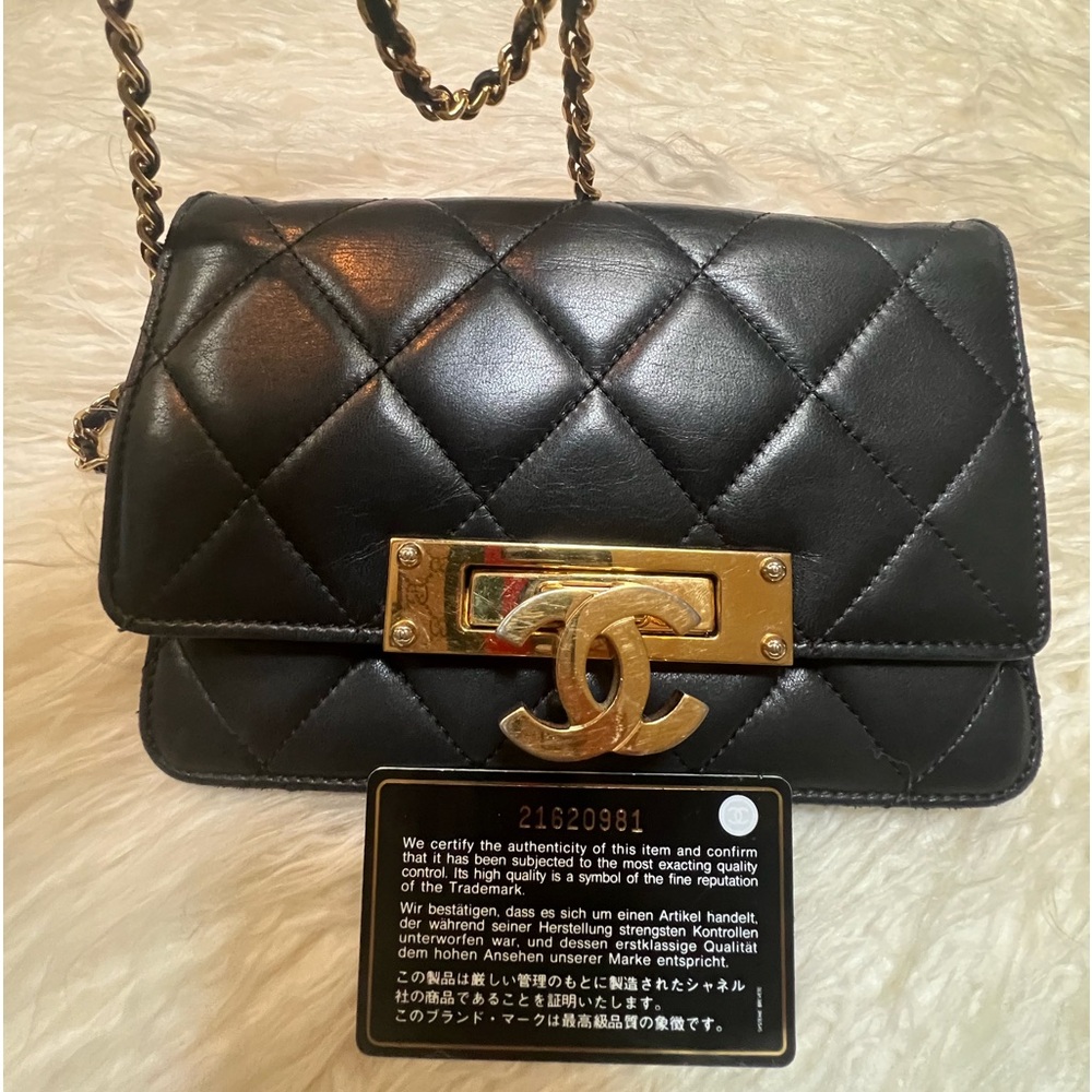 Vintage Chanel Golden Class WOC black lambskin quilted leather.